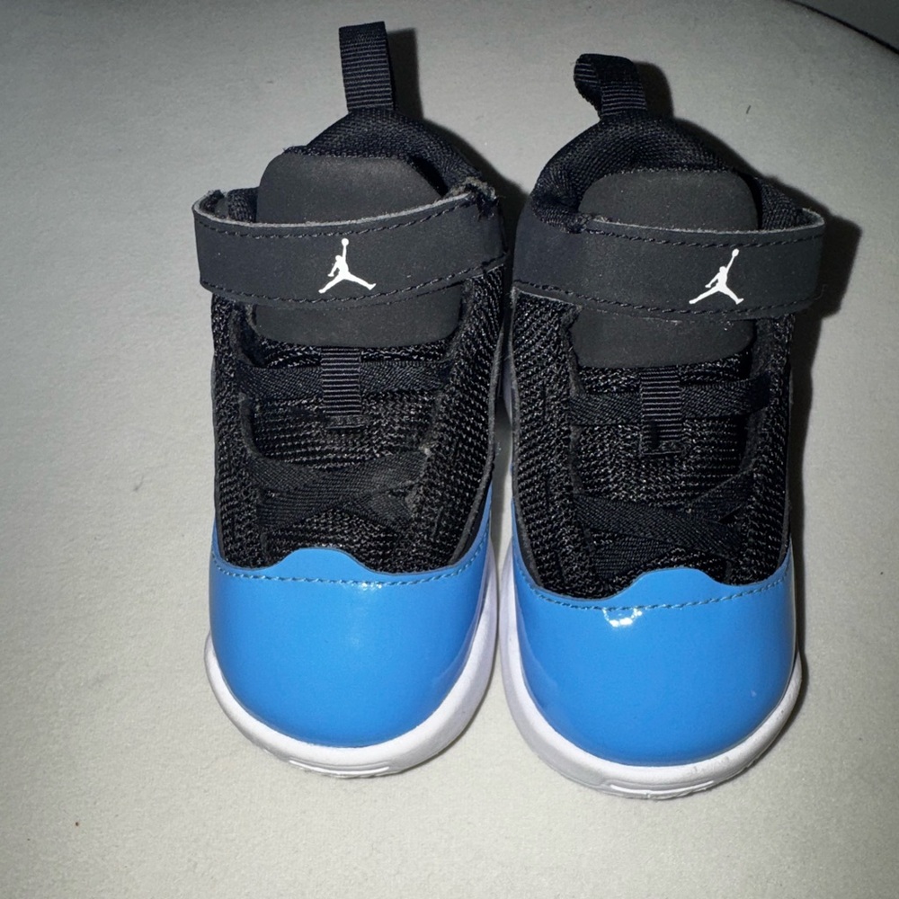 Jordan’s Nike 5C Kids Black and Blue Slip-On Sneakers with Hook Strap